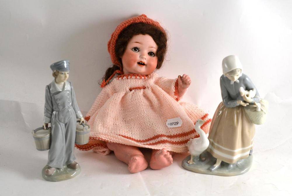 Lot 281 - Two Lladro figures and a Heubach Koppelsdorf 300 bisque head doll with composition bent limbs,...