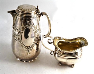 Lot 282 - Victorian silver hot water jug and Georgian silver cream jug (2)