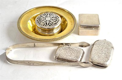 Lot 299 - Two hinged silver vestas, hinged silver small square box, pair of tongs, circular silver box...