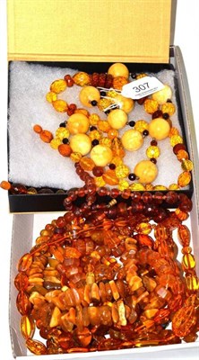 Lot 307 - Nine amber and amber type necklaces