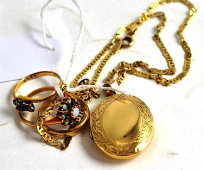 Lot 311 - A 9ct gold band ring, a locket on chain and two stone set rings