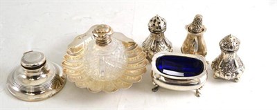 Lot 314 - Silver shell dish, small silver inkwell, silver mounted scent bottle, silver salt with blue...