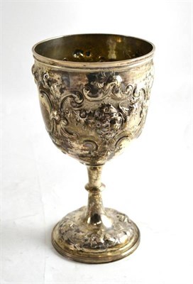 Lot 317 - A Victorian silver goblet with embossed decoration, London 1845