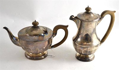 Lot 343 - A silver teapot and water jug