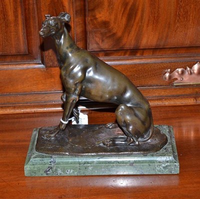 Lot 368 - A bronze figure of a seated greyhound on green marble base