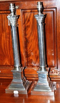 Lot 369 - A pair of silver plated Corinthian column table lamps