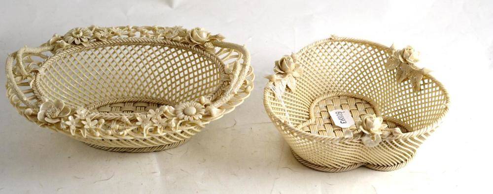 Lot 384 - A First Period Belleek woven lattice porcelain basket with floral encrustations and twin...