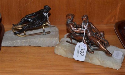 Lot 392 - Two bronzed figures on sledges