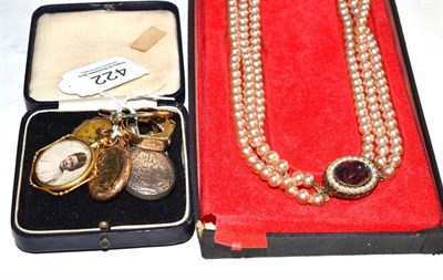 Lot 422 - An 18ct gold ring, a three stone ring and another stone set ring, lady's wristwatch with case...