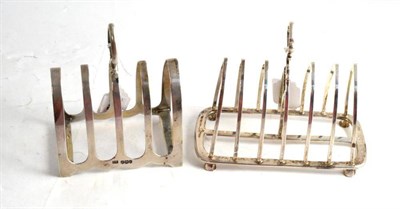 Lot 427 - Two silver toast racks