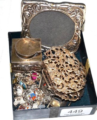 Lot 449 - A collection of silver including an inkwell, photograph frame, two nurses buckles and a charm...