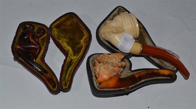 Lot 458 - Three meerschaum pipes (two cased)