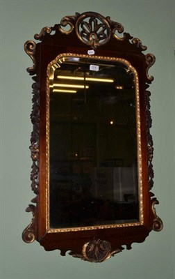 Lot 516 - A 19th century mahogany fret cut wall mirror