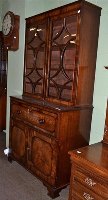 Lot 520 - A 19th century mahogany secretaire bookcase