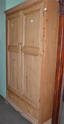 Lot 535 - A pine double wardrobe