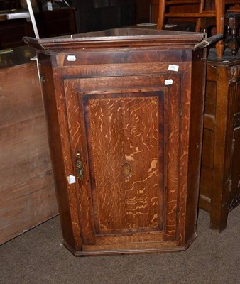 Lot 542 - George III oak corner cupboard