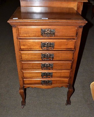 Lot 548 - An Edwardian mahogany music cabinet