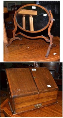 Lot 562 - Oak stationary table top cabinet and a toilet mirror (2)