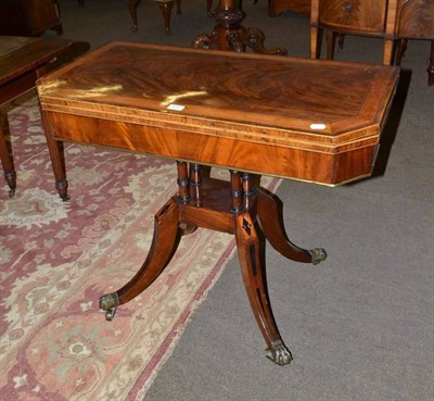 Lot 570 - A mahogany inlaid folding card table