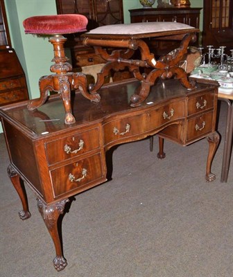 Lot 573 - A late 19th century cross framed stool, a walnut revolving piano stool and a reproduction...