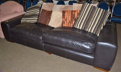 Lot 581 - Large modern leather two seater sofa and eight assorted cushions