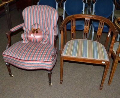 Lot 587 - A late 19th century open armchair with modern upholstery and matching frog cushion and an Edwardian