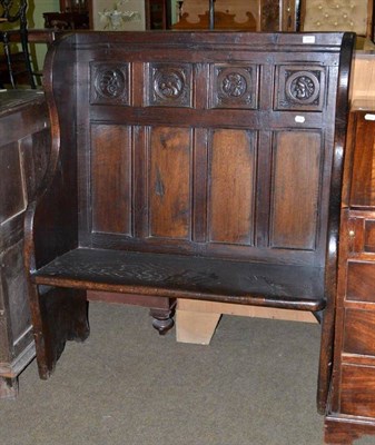 Lot 594 - A 19th century oak panel back settle (made up)