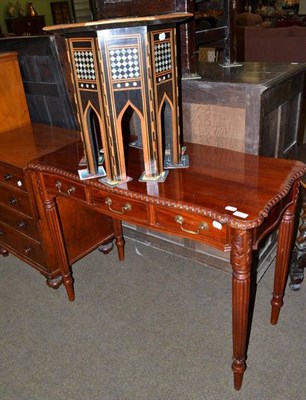 Lot 600 - A modern reproduction three drawer side table and an Eastern style mother of pearl inlaid table