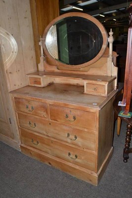 Lot 617 - A pine three height dressing table with mirror