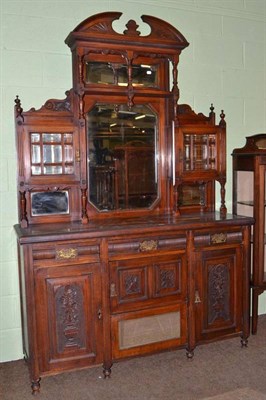 Lot 622 - A late 19th/early 20th century walnut mirror back sideboard