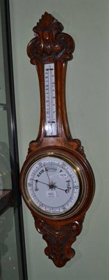 Lot 643 - Carved oak wall barometer