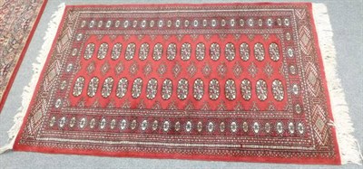 Lot 692 - Small red Eastern rug