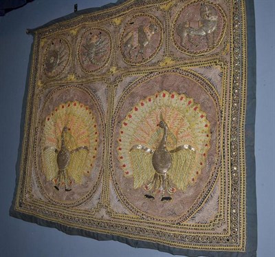 Lot 726 - An Eastern embroidered wall hanging with sequin decoration and a box of assorted plated wares...