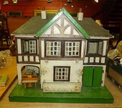 Lot 745 - Dolls house, dolls, textiles and a Singer sewing machine