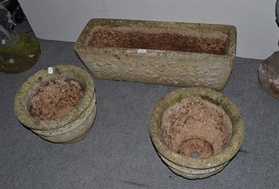 Lot 773 - A pair of circular garden planters and another of rectangular form