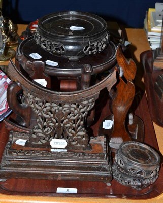 Lot 5 - A collection of Chinese carved plant/vase/plate stands