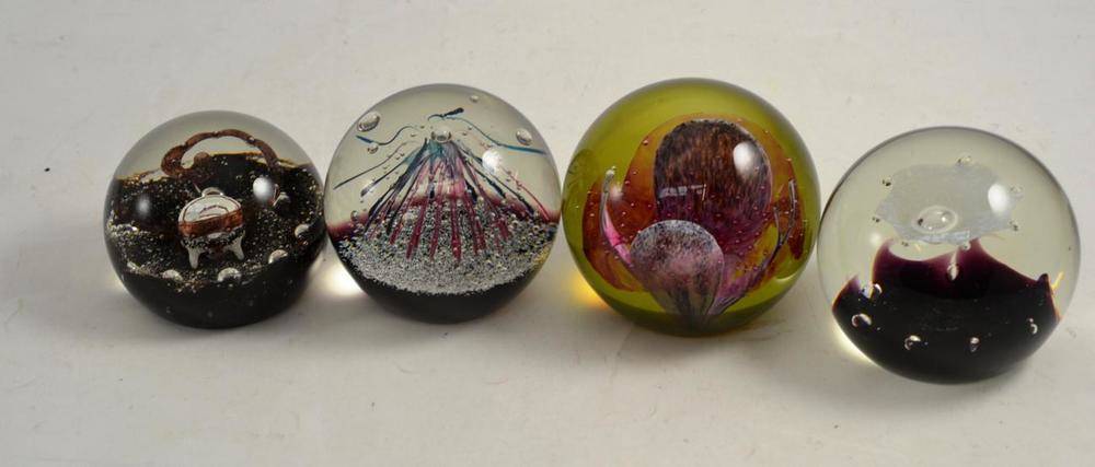 Lot 9 - Four boxed Caithness limited edition glass paperweights - Space Orchid, Space Pearl, Alien and...