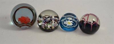 Lot 11 - Four boxed Caithness limited edition glass paperweights - Marguerite, May Dance, Harlequin...