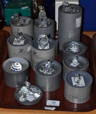 Lot 16 - Ten boxed Swarovski Crystal ornaments:- fox, pair of swans, coiled snake, Frog Prince, owl,...