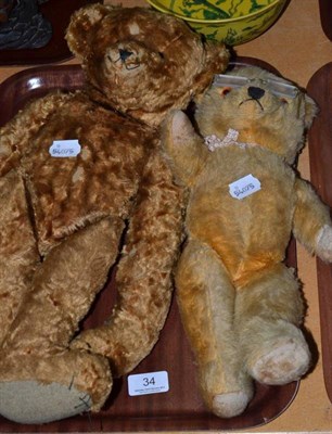 Lot 34 - A 1953 Chad Valley musical teddy bear and a copy of a Steiff teddy bear (2)