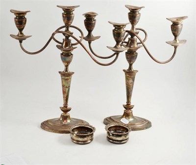 Lot 39 - Pair of silver plated three branch candelabra and pair of plated coasters