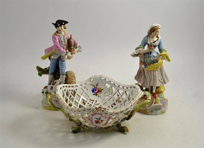 Lot 40 - A German lattice pierced and flower encrusted porcelain two handled basket and a pair of...