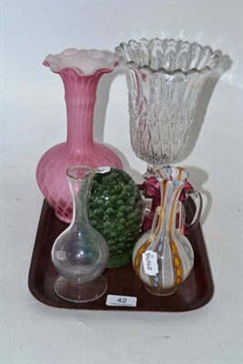 Lot 42 - A green glass dump, a cranberry glass cream jug, a pink satin glass vase, a moulded glass...