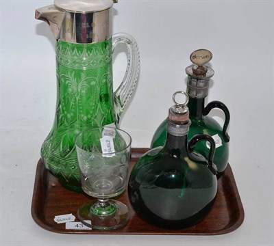 Lot 43 - A Webb green flashed glass champagne jug with wheel engraved decoration and plated mounts (a.f.), a