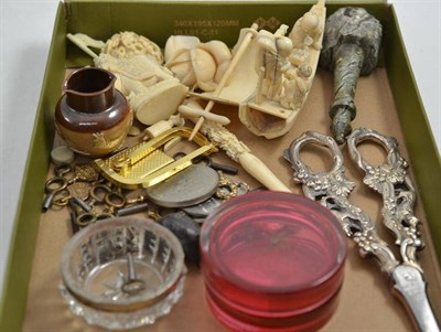 Lot 57 - A collection of Chinese and Japanese carved ivory circa 1900-1920, grape scissors, watch key, etc