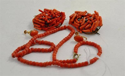 Lot 60 - A pair of coral earrings, a coral necklace and two coral brooches