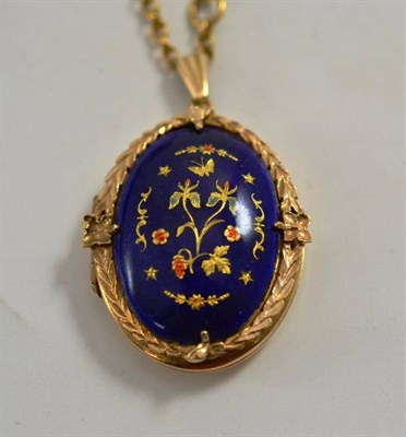 Lot 84 - A 9ct gold enamelled locket on chain