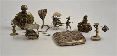 Lot 87 - A collection of Chinese white metal figures, scent bottles, etc (8)