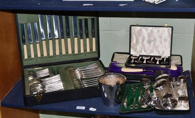 Lot 111 - A Walker and Hall canteen of silver plated flatware, silver manicure set, plated and ivory fish...