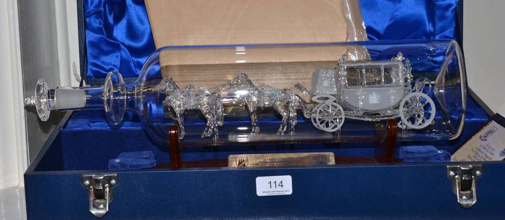 Lot 114 - A Lichfield glass sculpture 'The Glass Coach' limited edition number 8/50, with original case,...